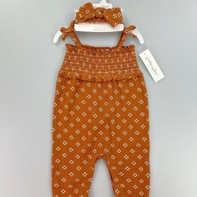 Baby girl's smocked romper with a matching headband