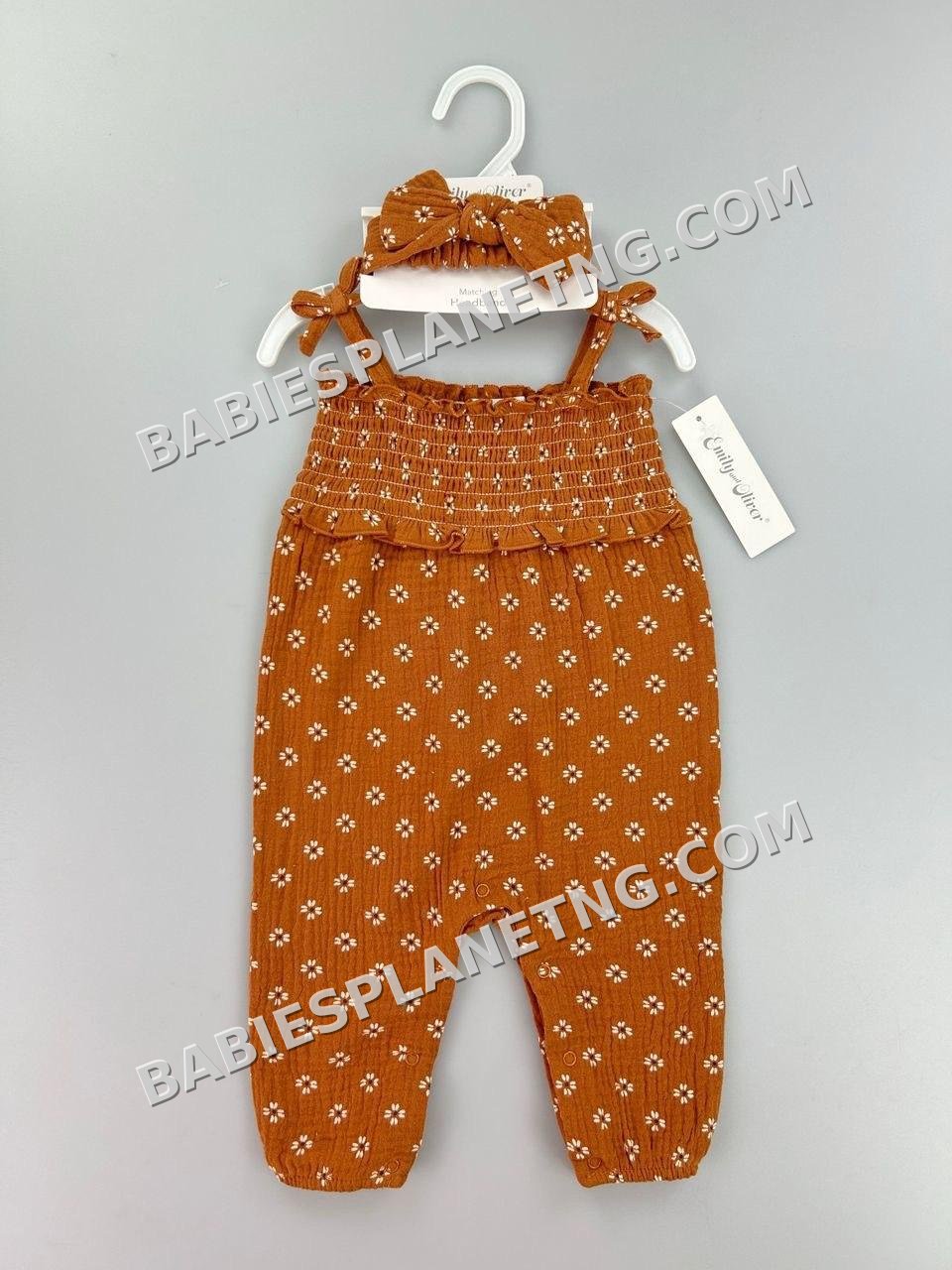 Baby girl's smocked romper with a matching headband